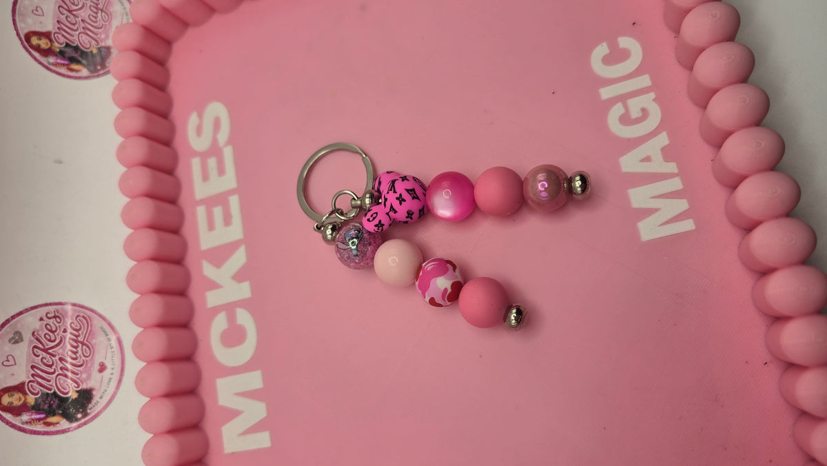 Lv mini bag charm